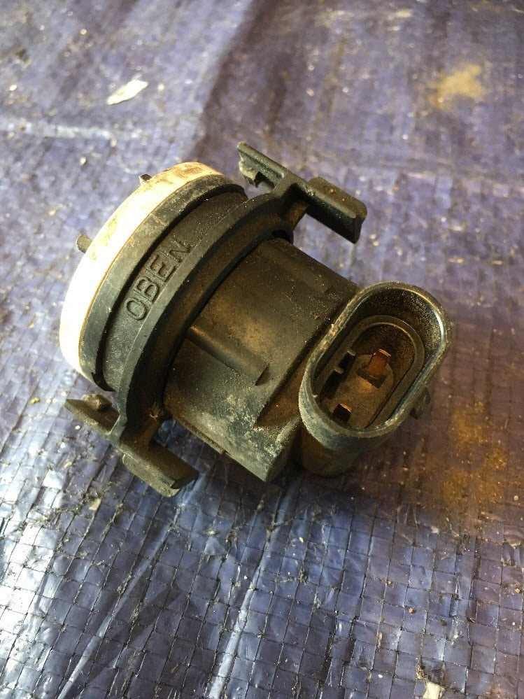 Headlight Bulb Holder Black Type from a BMW E46 CI Coupe