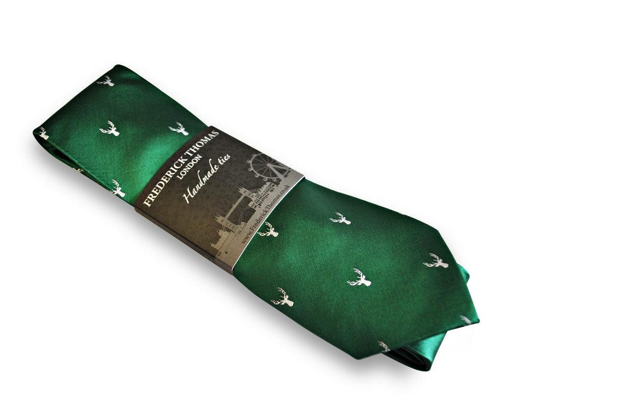 green tie with white stag deer head silhouette design