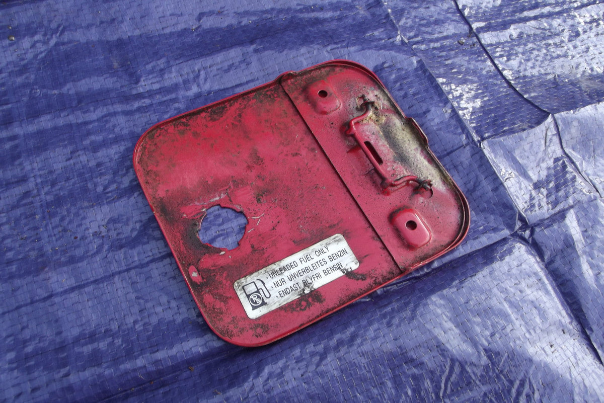 PETROL FUEL FLAP DOOR RED   from SUZUKI SWIFT 1.3 GLS  YEAR 2000