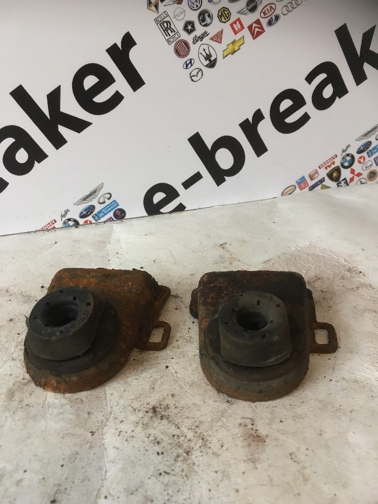 Radiator Mounting Brackets Pair From a FORD COUGAR COUPE